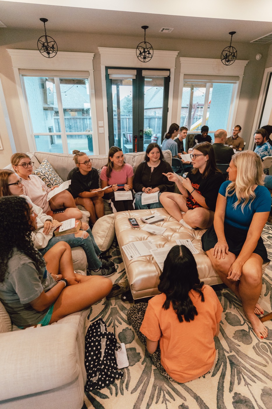 AYA discipleship conversation in a living room